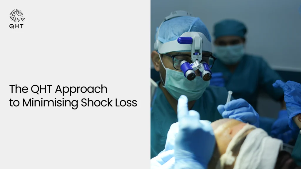 QHT Clinic surgeons using sapphire-tipped instruments and high magnification to minimize follicle damage during transplantation.
